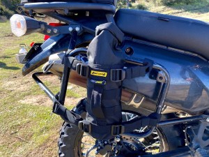 Photo of RG-1060 Trails End Fuel Bottle Holder attached to pannier rack